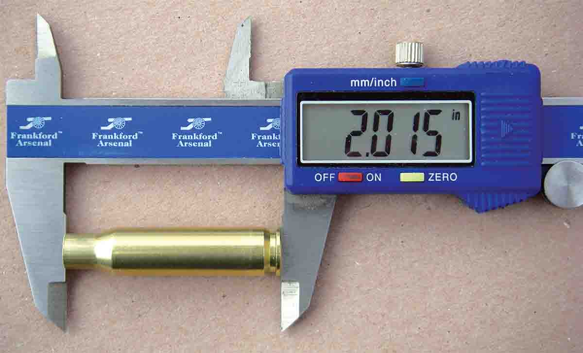 Maximum case length for the .308 Winchester is 2.015 inches.  Maximum overall cartridge length for the .308 Winchester is 2.810 inches, though many bullet profiles must be seated to a shorter overall length to allow correct chambering in production rifles.